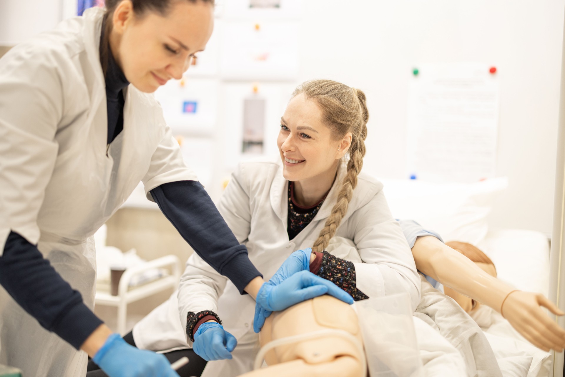 Medical Nurses Training Practice with Smiling Professionals in a Bright Hospital Setting